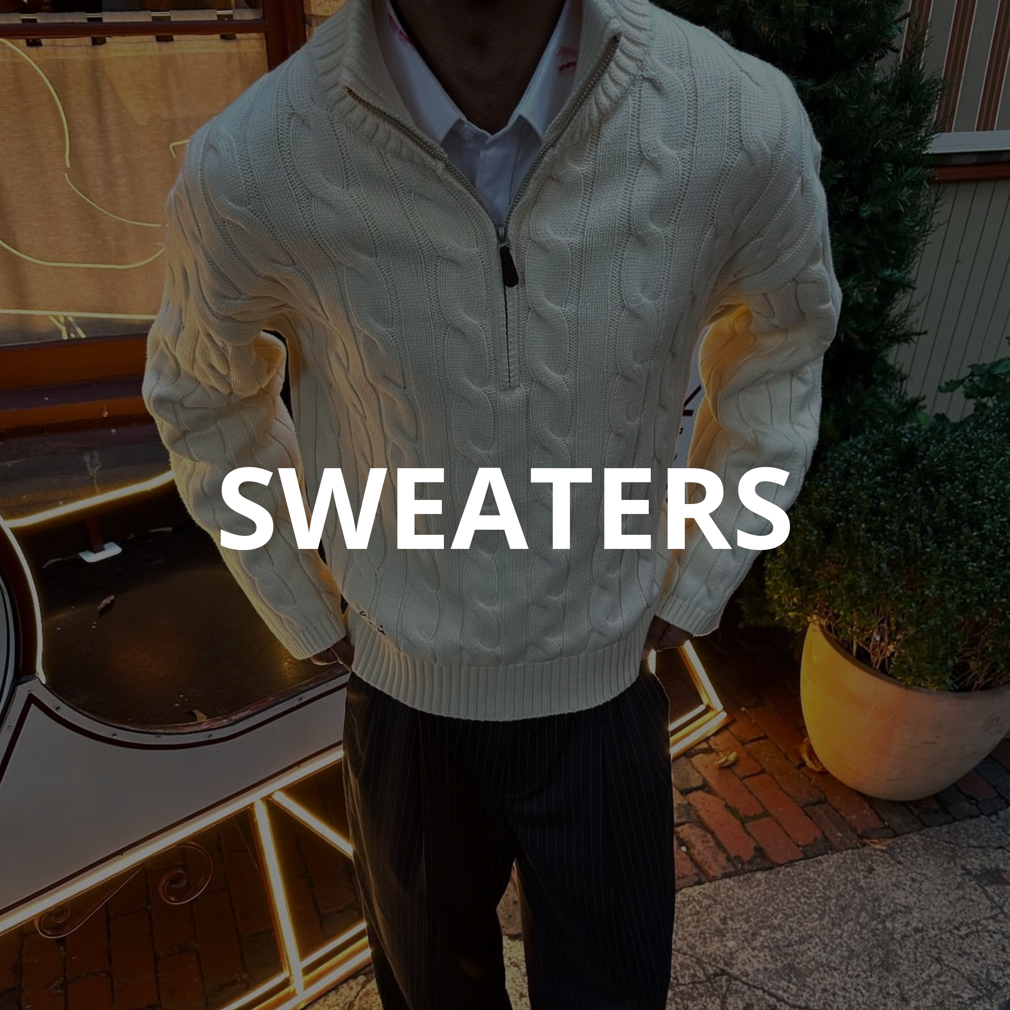 SWEATERS